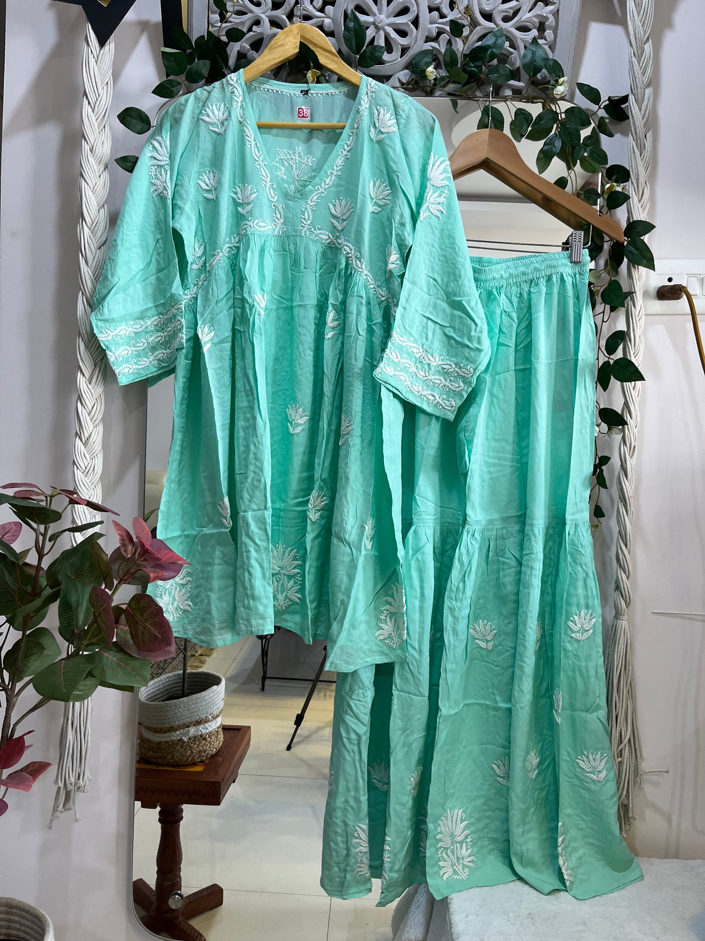 Sara Gharara set sea green
